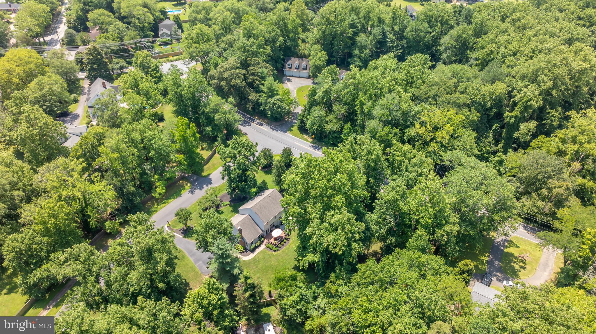 1600 Old Mill Bottom Run Annapolis, MD 21409 - Photo 52 of 56 an aerial view of residential house with outdoor space and trees all around