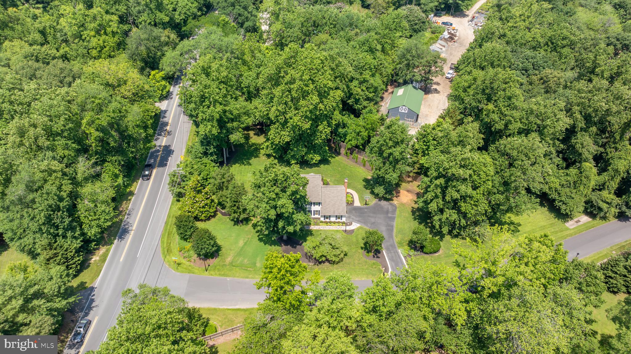 1600 Old Mill Bottom Run Annapolis, MD 21409 - Photo 54 of 56 an aerial view of a house with a yard