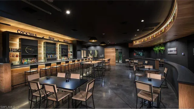 a view of an outside dining space with furniture