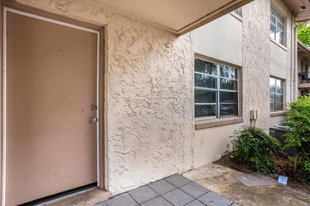 1910 Honour Road, Unit 2 Orlando, FL 32839 - Photo 1 of 1 a view of a entryway door front of a house