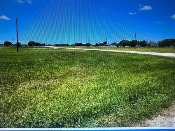 a view of a golf course with a lake