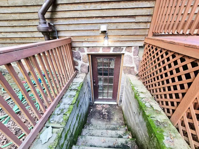 a view of entryway with a front door