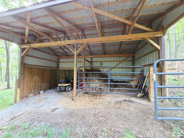 a view of room with wooden ceiling