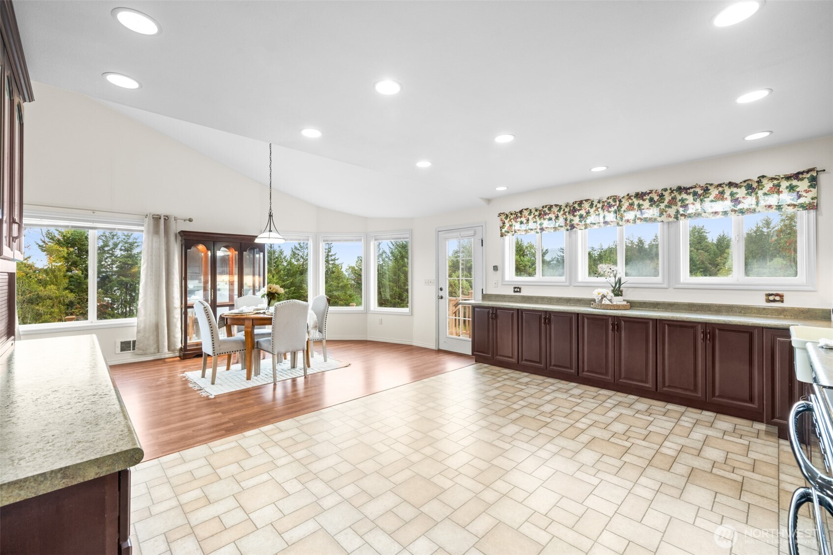 382 Discovery View Drive Sequim, WA 98382 - Photo 12 of 40 a living room with furniture a large window with kitchen view