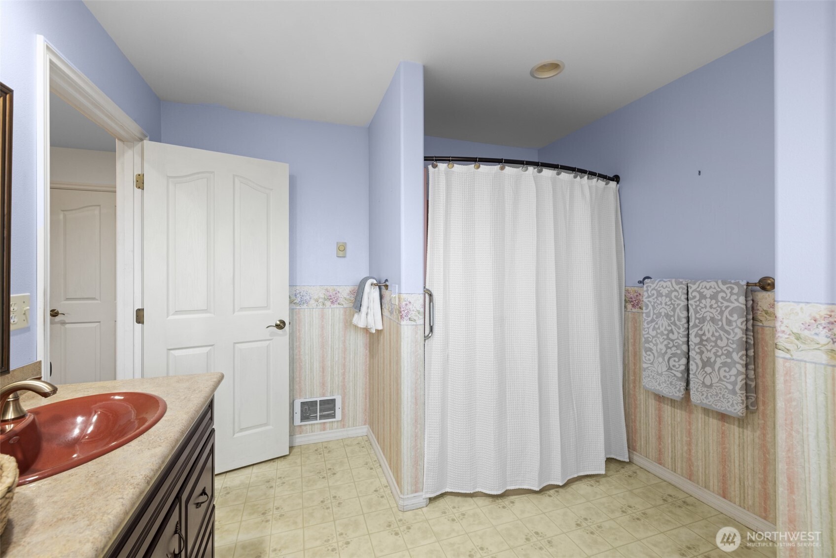 382 Discovery View Drive Sequim, WA 98382 - Photo 18 of 40 a bathroom with a tub sink and shower