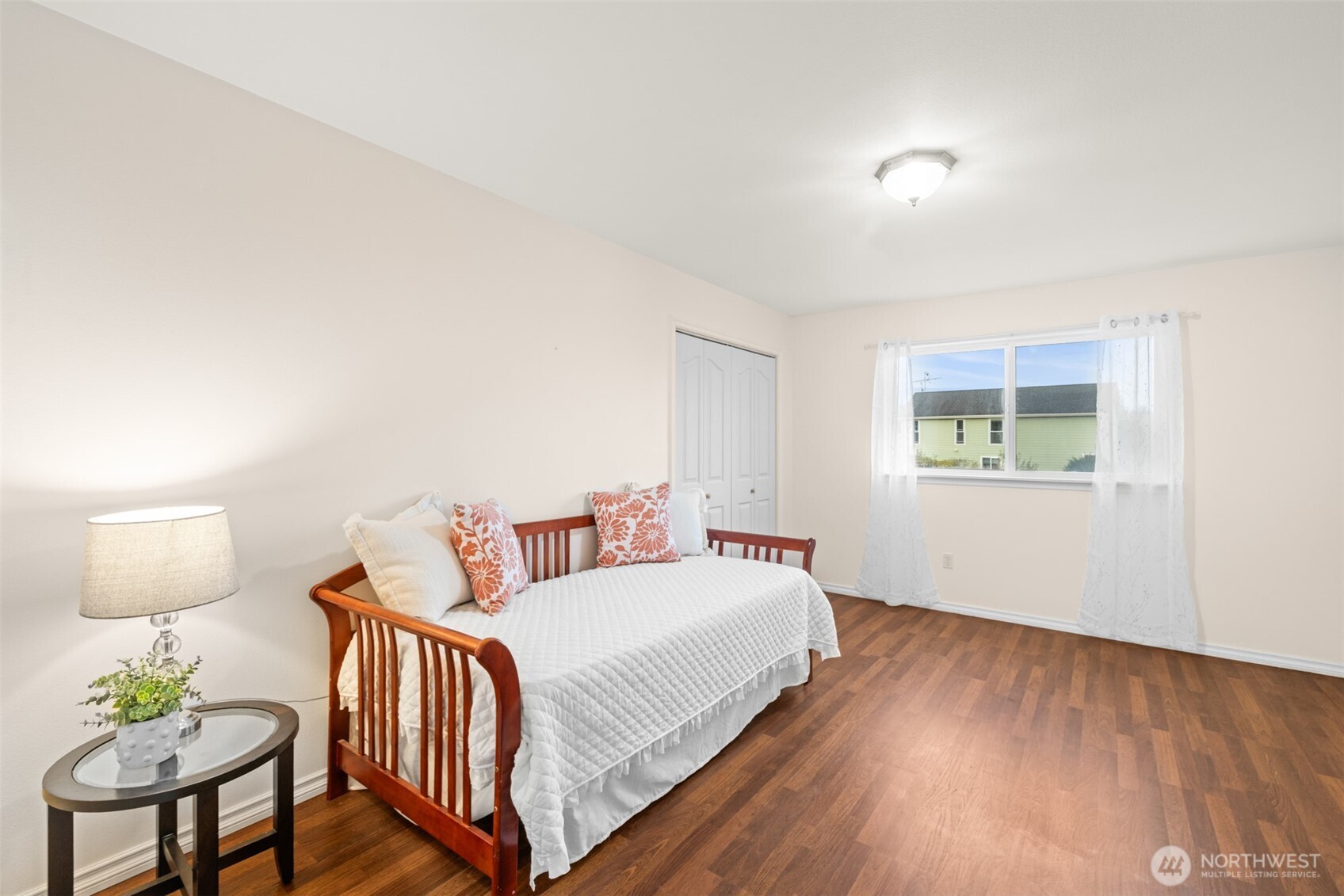 382 Discovery View Drive Sequim, WA 98382 - Photo 20 of 40 a bedroom with a bed and a window