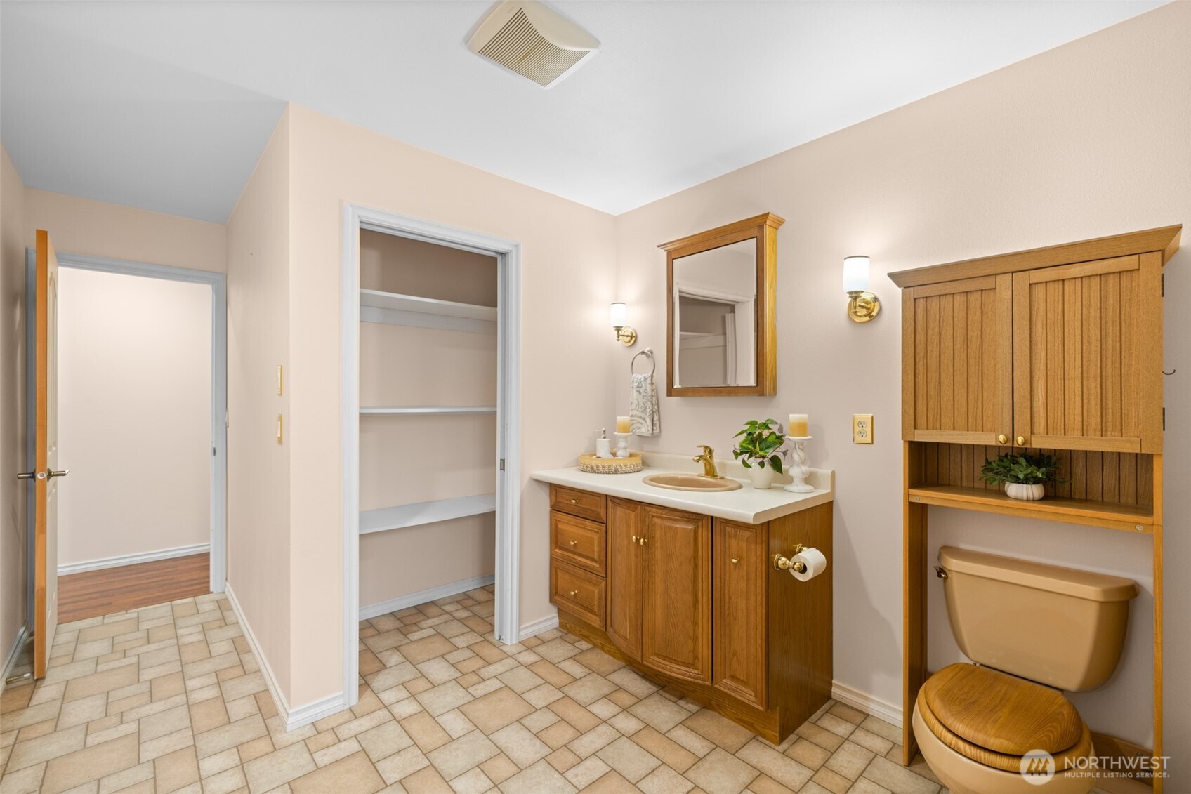 382 Discovery View Drive Sequim, WA 98382 - Photo 27 of 40 a room with a sink cabinets and wooden floor