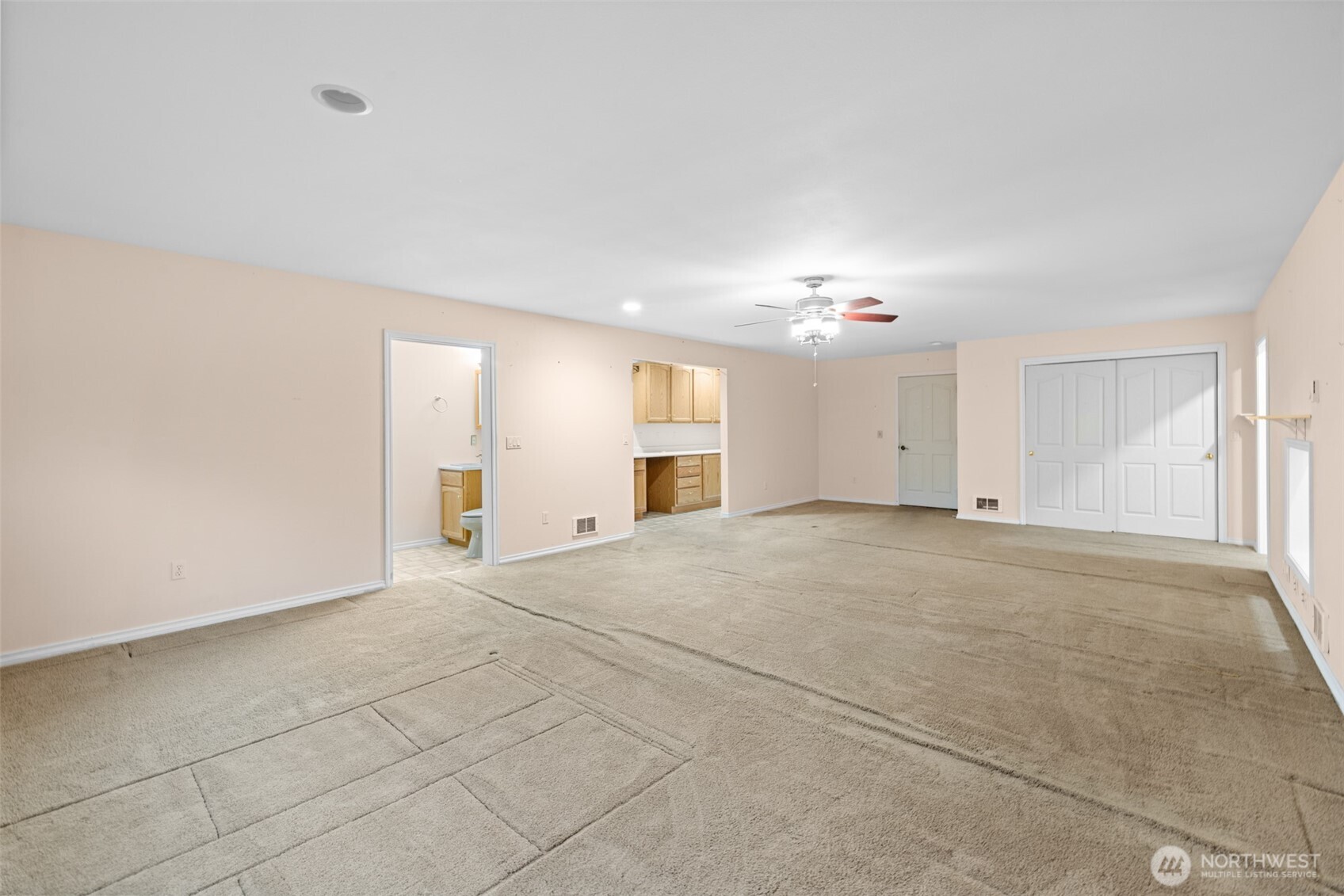 382 Discovery View Drive Sequim, WA 98382 - Photo 30 of 40 a view of an empty room with chandelier and a window