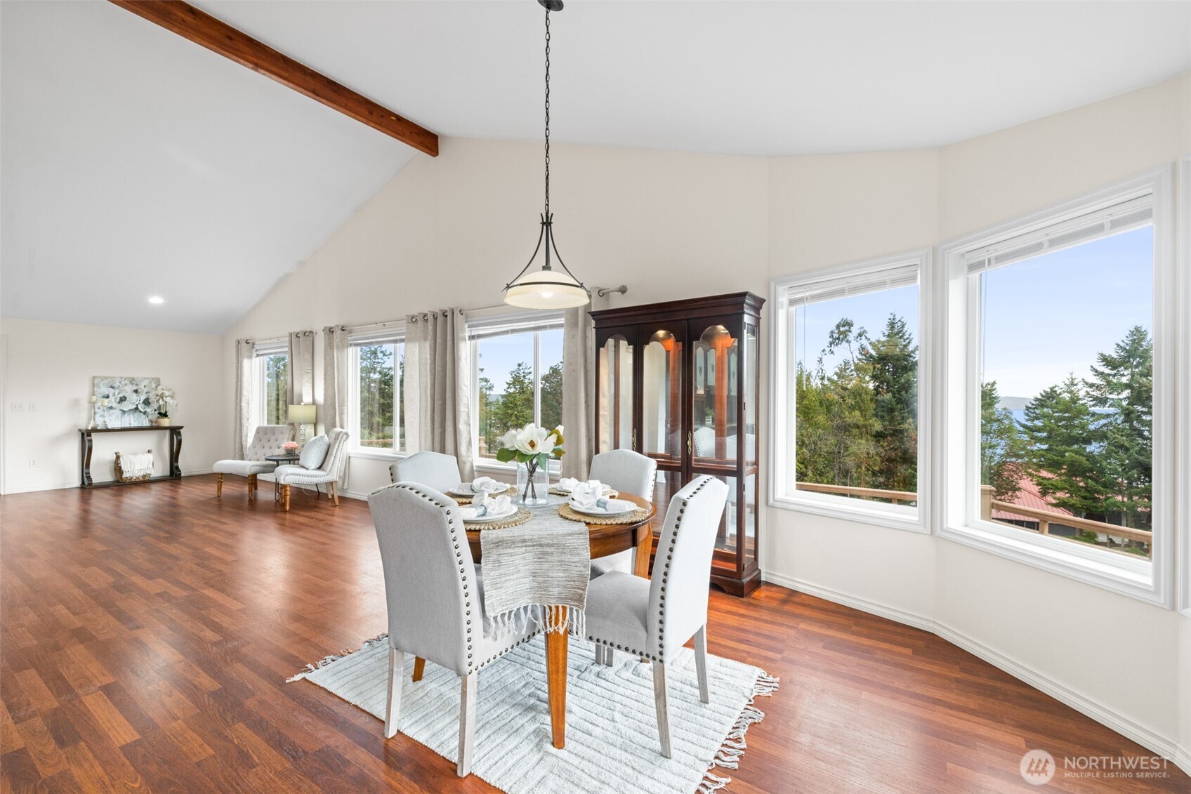 382 Discovery View Drive Sequim, WA 98382 - Photo 9 of 40 a view of a dining room with furniture window and wooden floor
