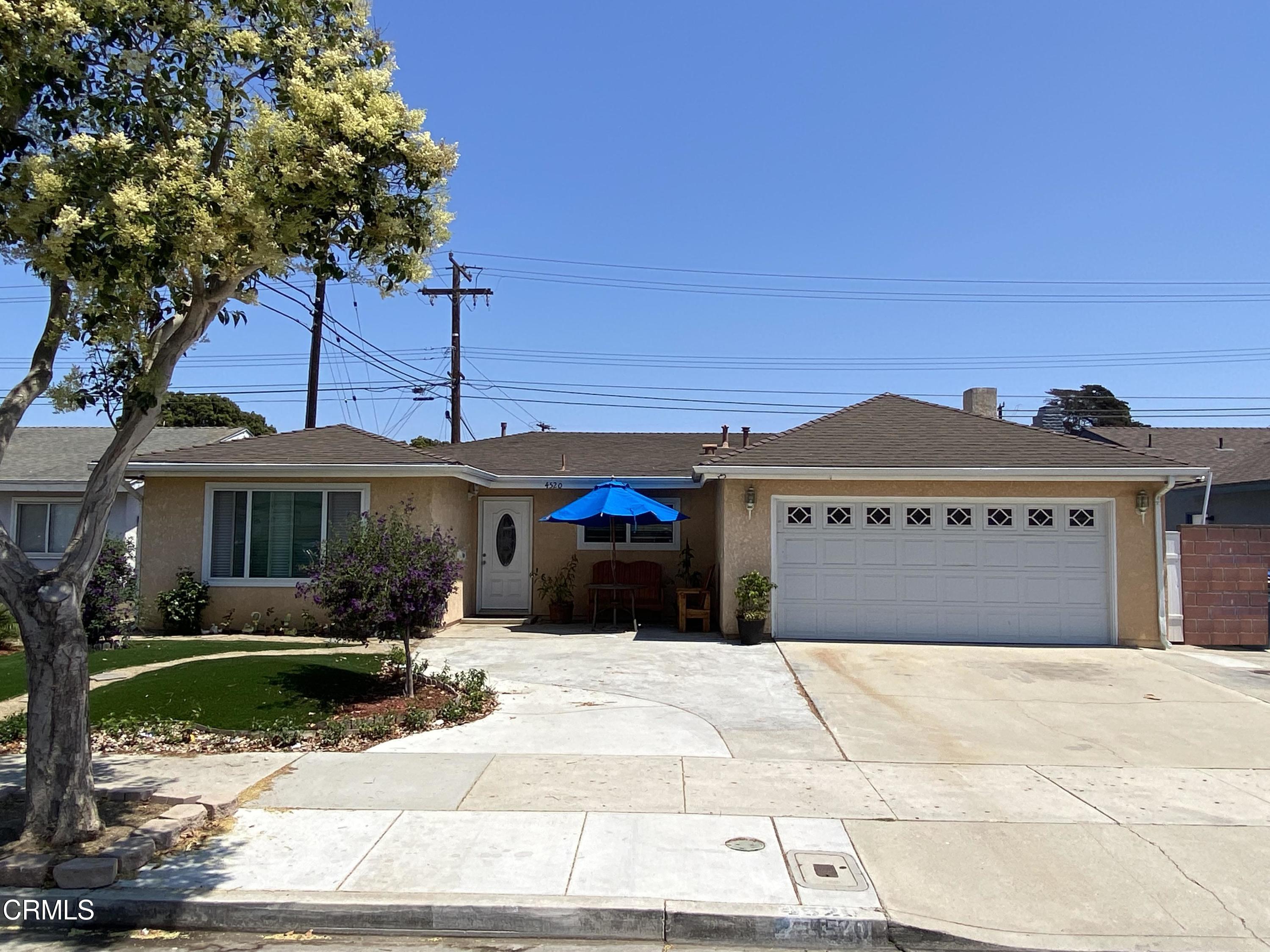 4520 Reeder Avenue Oxnard, CA 93033 - Photo 1 of 28 a front view of a house with yard