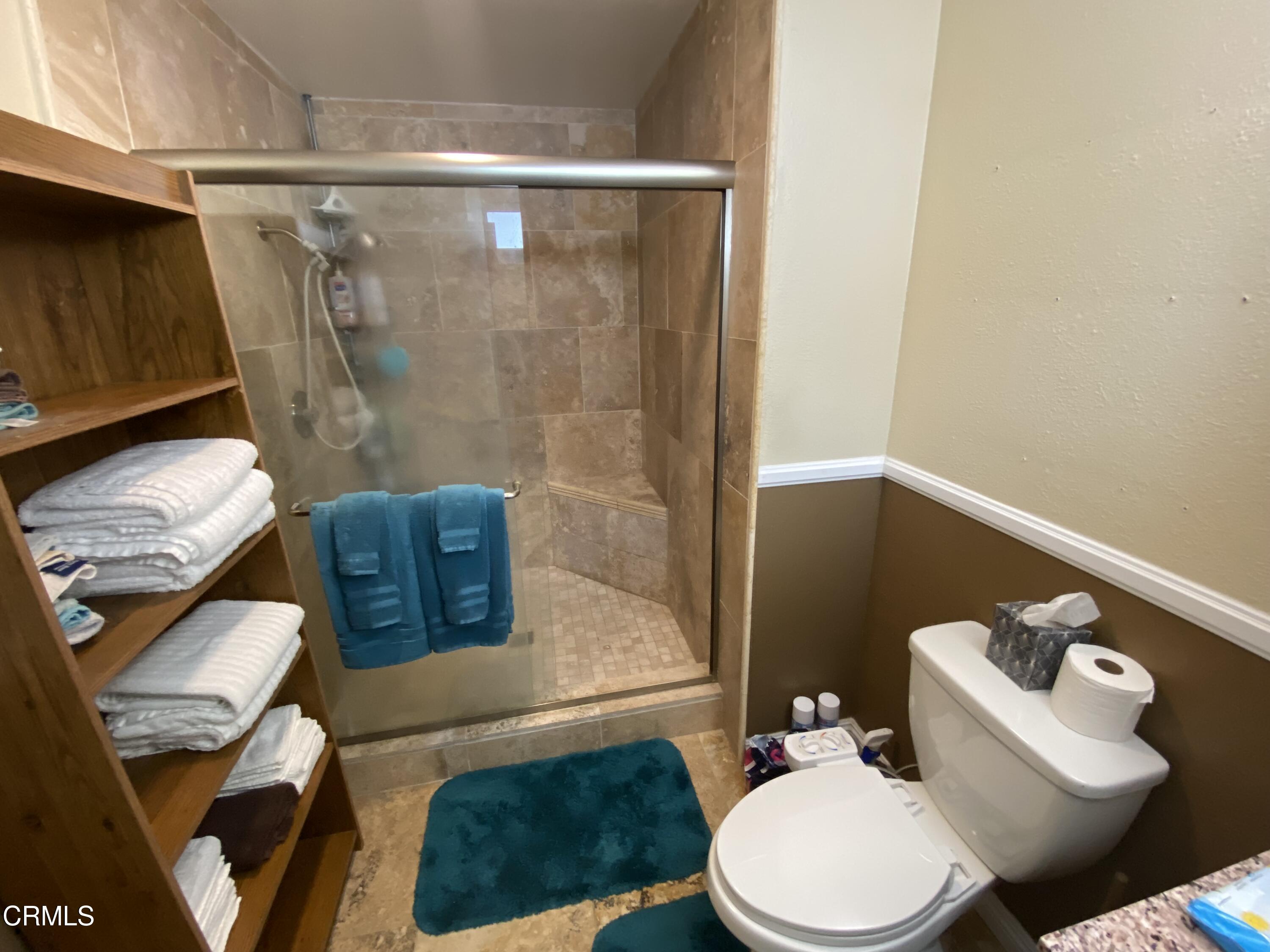 4520 Reeder Avenue Oxnard, CA 93033 - Photo 19 of 28 a bathroom with a toilet and shower