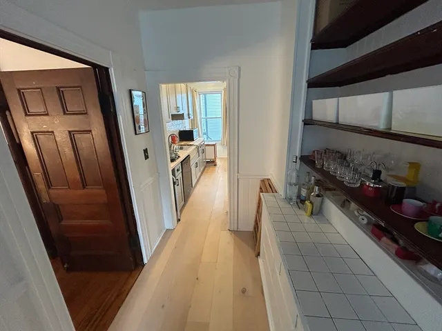 a kitchen that has a sink and a stove