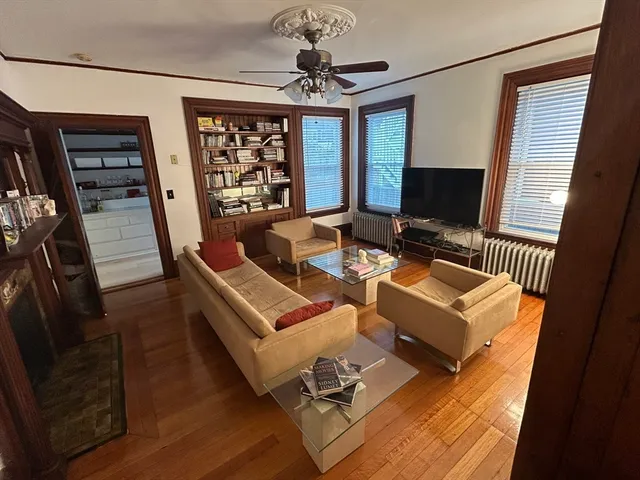 a view of a livingroom with furniture and a fireplace