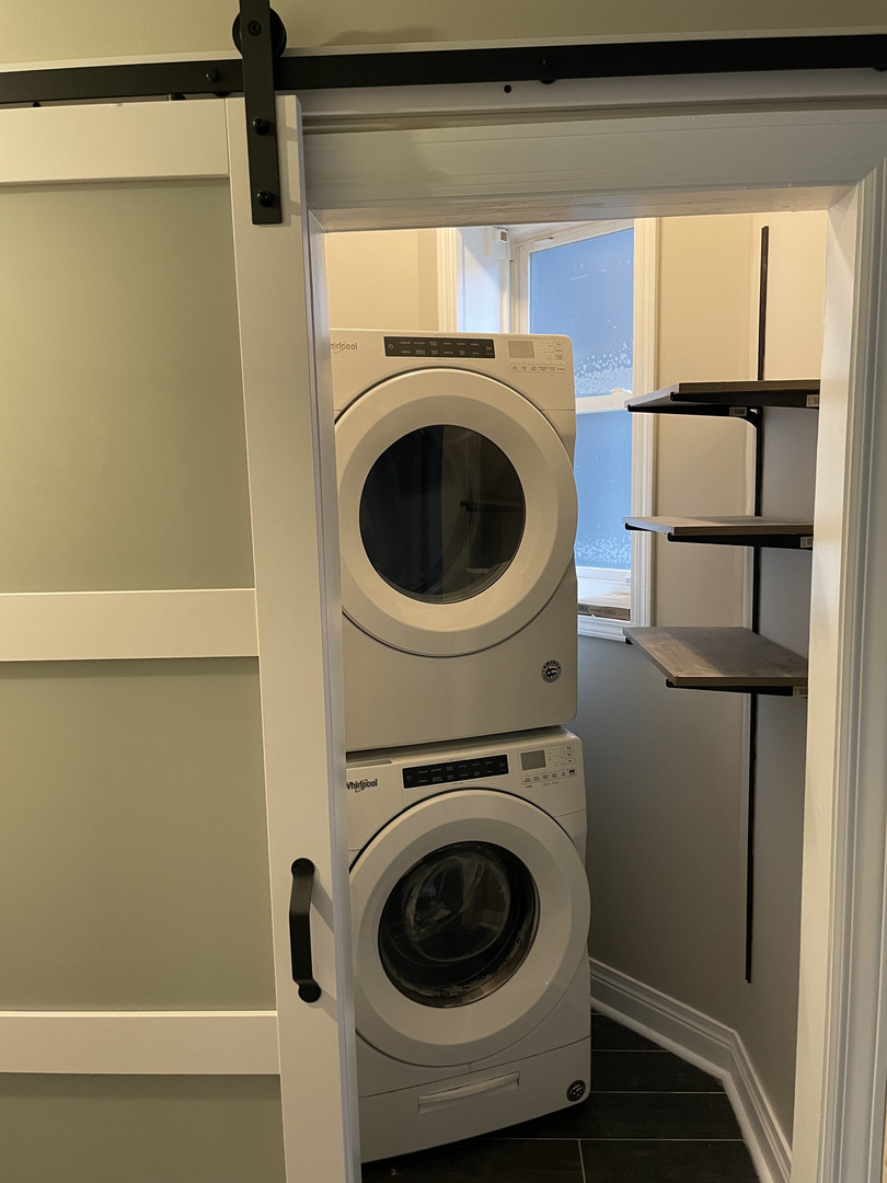 2826 West Lyndale Street, Unit 1 Chicago, IL 60647 - Photo 10 of 20 a utility room with dryer and washer