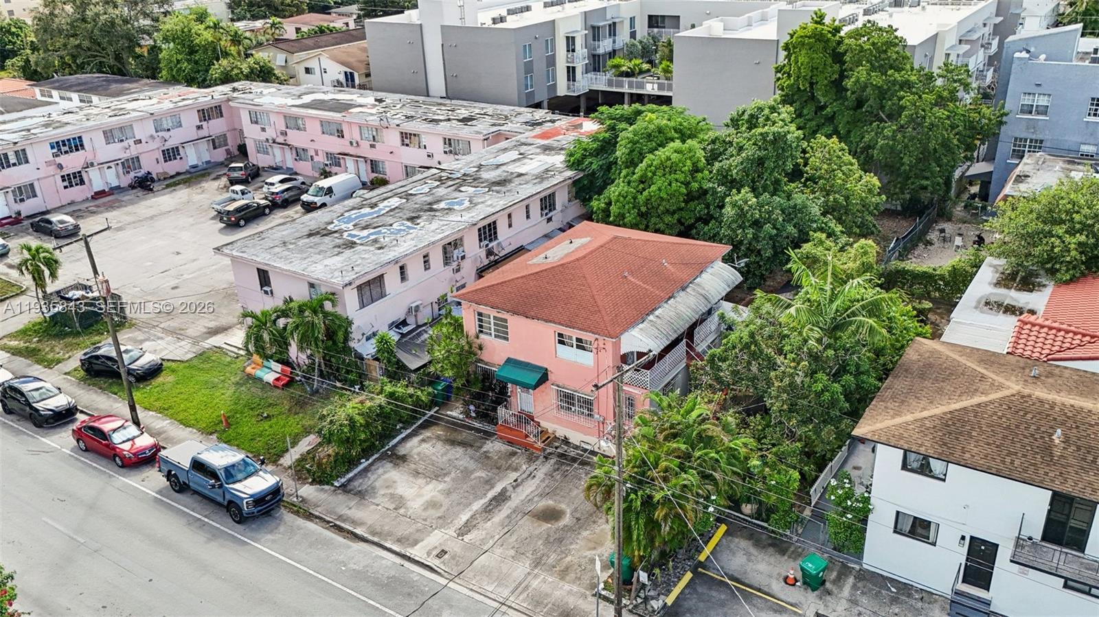 984 Southwest 6th Street Miami, FL 33130 - Photo 4 of 11 an aerial view of a house with a garden and street view