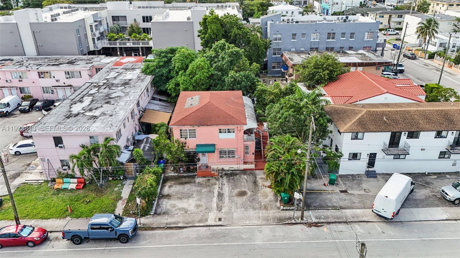 984 Southwest 6th Street Miami, FL 33130 - Photo 5 of 11 an aerial view of multiple houses with yard
