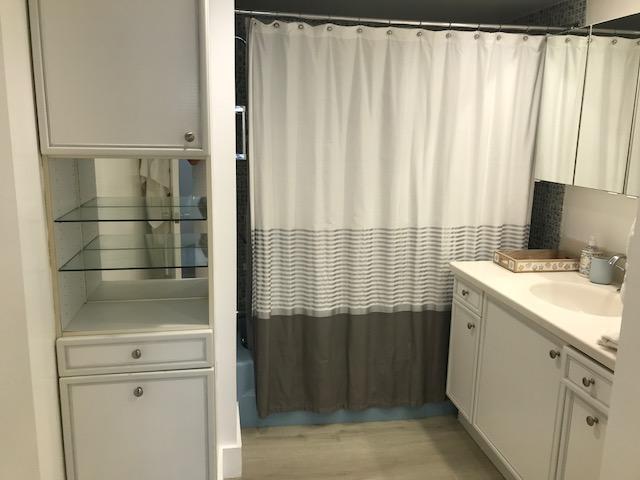 2871 North Ocean Boulevard, Unit V457 Boca Raton, FL 33431 - Photo 21 of 42 a bathroom with a shower and a sink