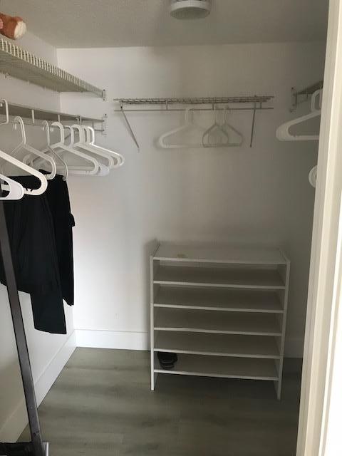 2871 North Ocean Boulevard, Unit V457 Boca Raton, FL 33431 - Photo 25 of 42 a view of walk in closet with clothes and shoes