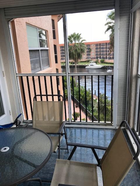 2871 North Ocean Boulevard, Unit V457 Boca Raton, FL 33431 - Photo 39 of 42 a view of balcony with furniture