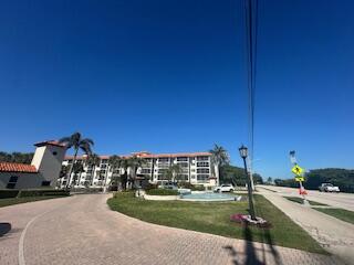 2871 North Ocean Boulevard, Unit V457 Boca Raton, FL 33431 - Photo 6 of 42 a view of a street with a building in the background