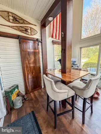 a view of a backyard with plants and a patio