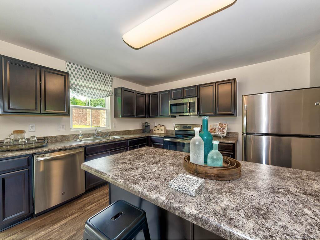 1104 Tangle Ridge Drive Southeast Concord, NC 28025 - Photo 7 of 37 Gallery Image 7