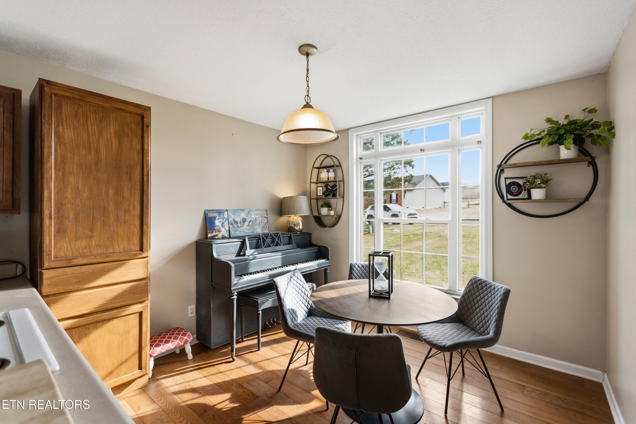 450 Emerts View Circle Seymour, TN 37865 - Photo 11 of 27 a view of a dining room with furniture window and wooden floor