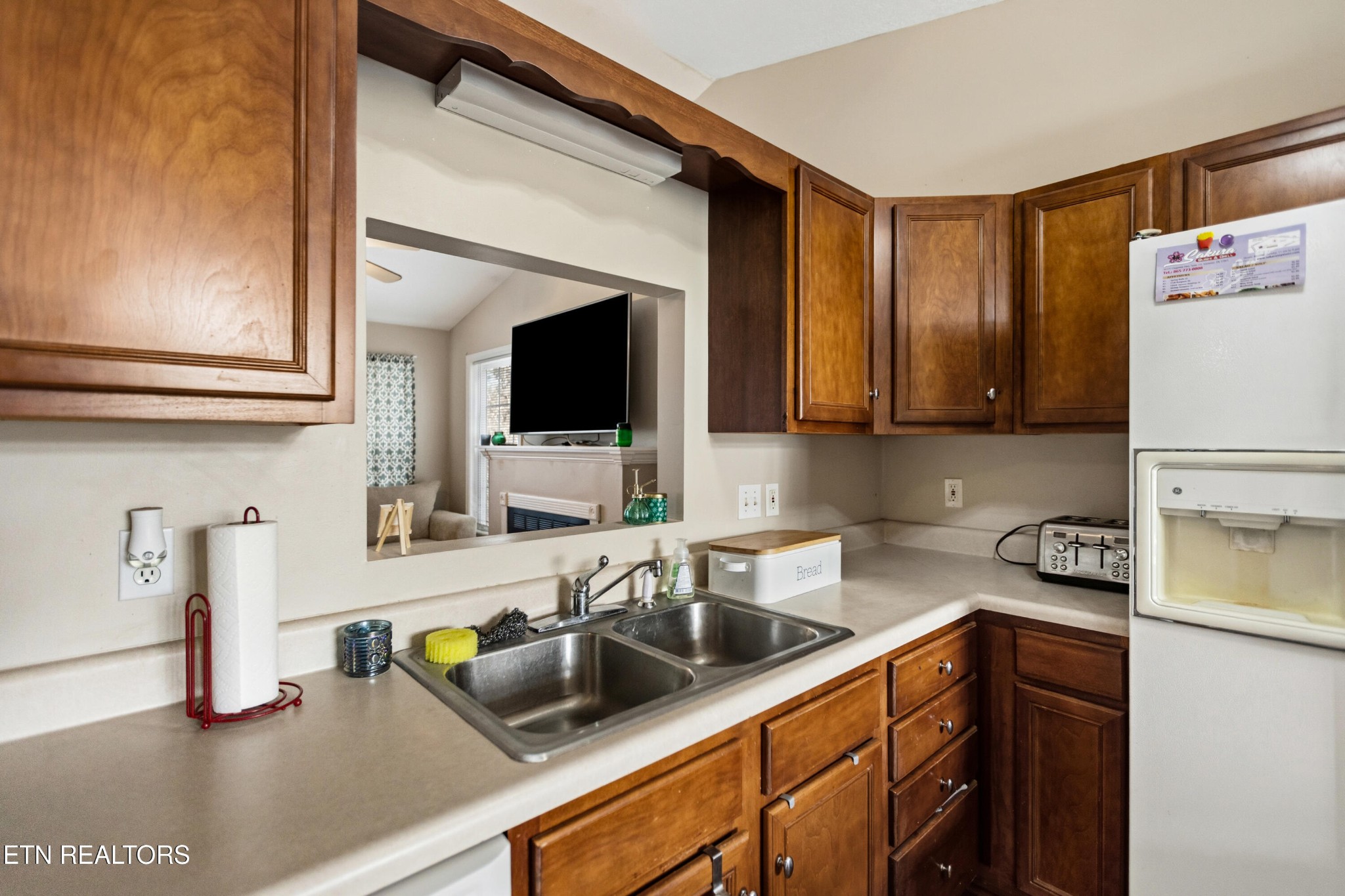 450 Emerts View Circle Seymour, TN 37865 - Photo 7 of 27 a kitchen with stainless steel appliances granite countertop a sink and a microwave