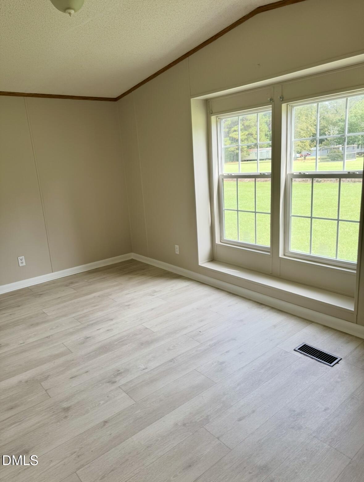 9614 Dunn Road Godwin, NC 28344 - Photo 9 of 9 an empty room with a window