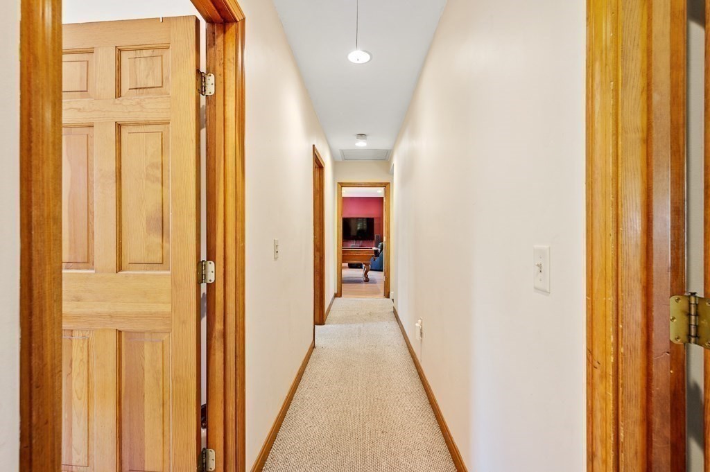 8 Hyde Street Worcester, MA 01606 - Photo 23 of 36 a view of a hallway with wooden floor
