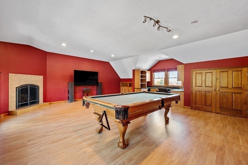 8 Hyde Street Worcester, MA 01606 - Photo 24 of 36 a room with pool table windows and wooden floor