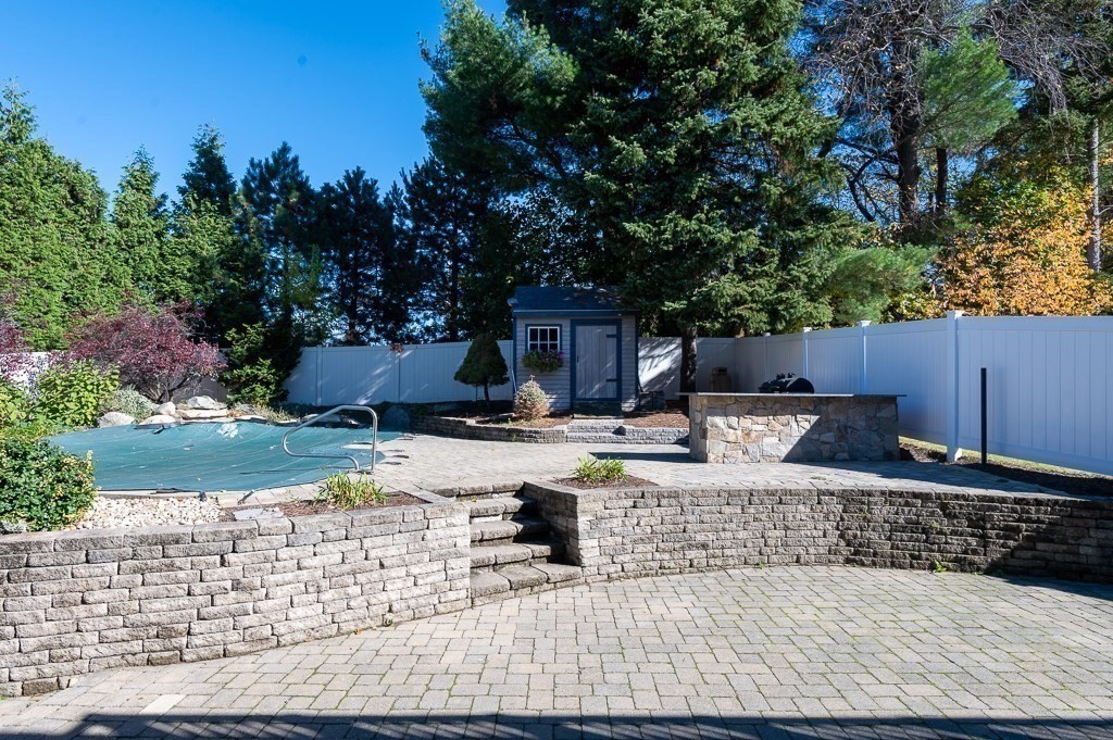 8 Hyde Street Worcester, MA 01606 - Photo 32 of 36 a view of a house with backyard and sitting area