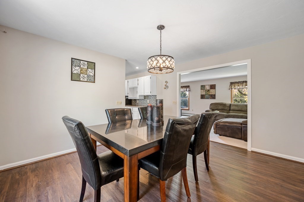 8 Hyde Street Worcester, MA 01606 - Photo 4 of 36 a view of a dining room with furniture window and wooden floor