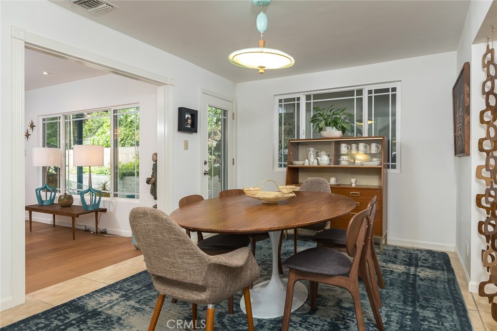 3611 El Lado Drive Glendale, CA 91208 - Photo 13 of 31 a view of a dining room with furniture window and outside view