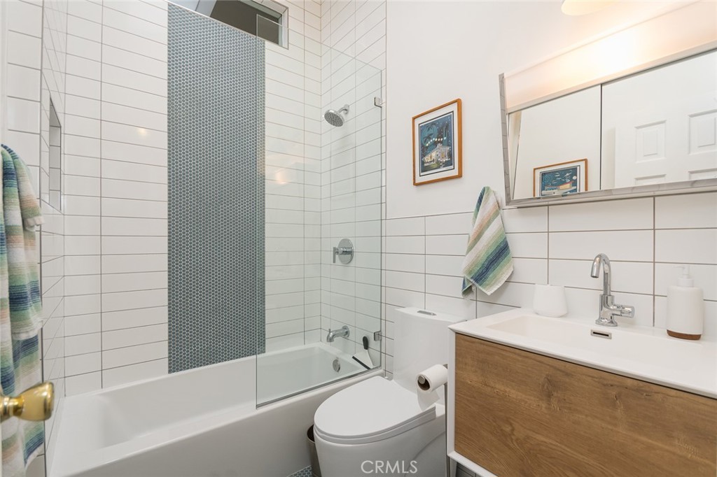 3611 El Lado Drive Glendale, CA 91208 - Photo 21 of 31 a bathroom with a sink a toilet and shower