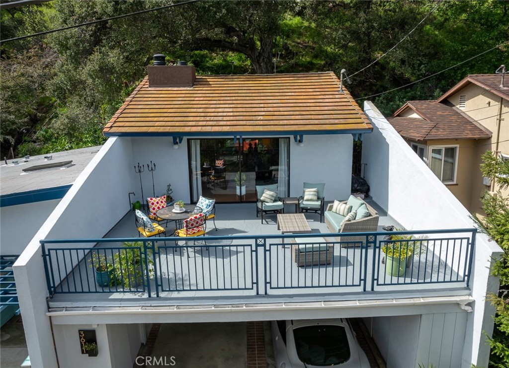 3611 El Lado Drive Glendale, CA 91208 - Photo 24 of 31 a view of a chair and tables in the balcony