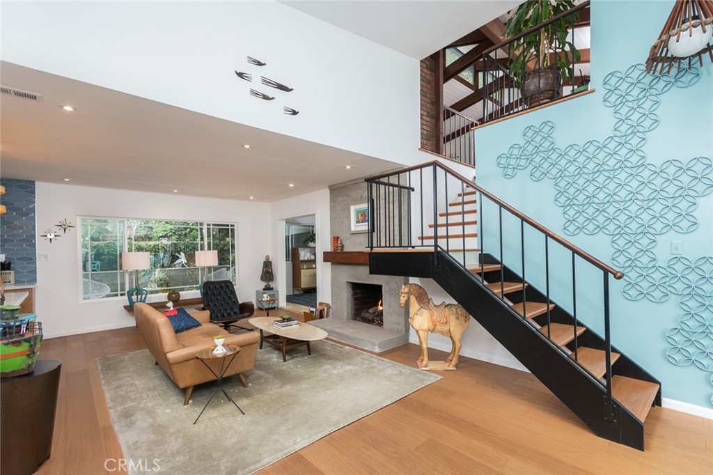 3611 El Lado Drive Glendale, CA 91208 - Photo 5 of 31 a living room with furniture and wooden floor