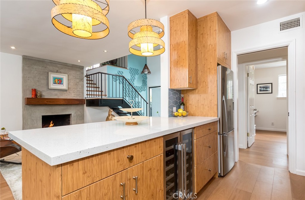 3611 El Lado Drive Glendale, CA 91208 - Photo 8 of 31 a kitchen with a sink cabinets and a wooden floor