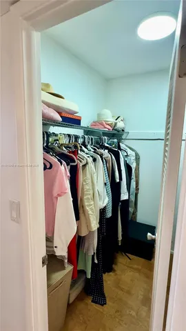 a view of a room and window