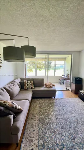 a view of a golf course with a lake