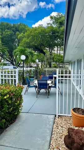 a bathroom with a sink mirror vanity and toilet