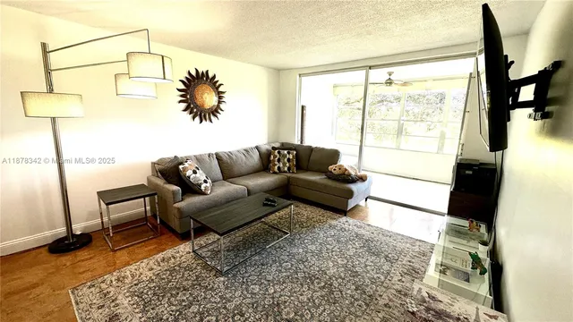 a bedroom with a bed and a mirror