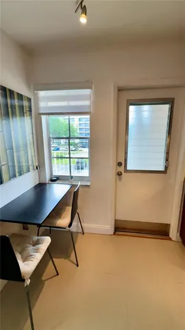 a kitchen with stainless steel appliances a stove and a refrigerator