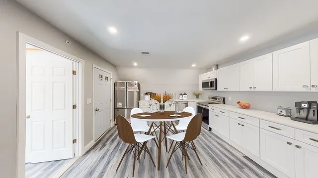 a view of a dining room with furniture