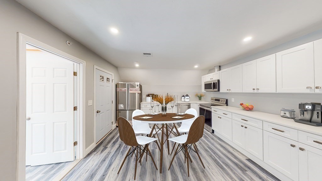 116 Malvern Road, Unit 2 Worcester, MA 01610 - Photo 2 of 14 a view of a dining room with furniture