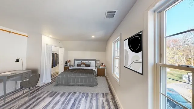 a en suite bathroom with a sink and a mirror