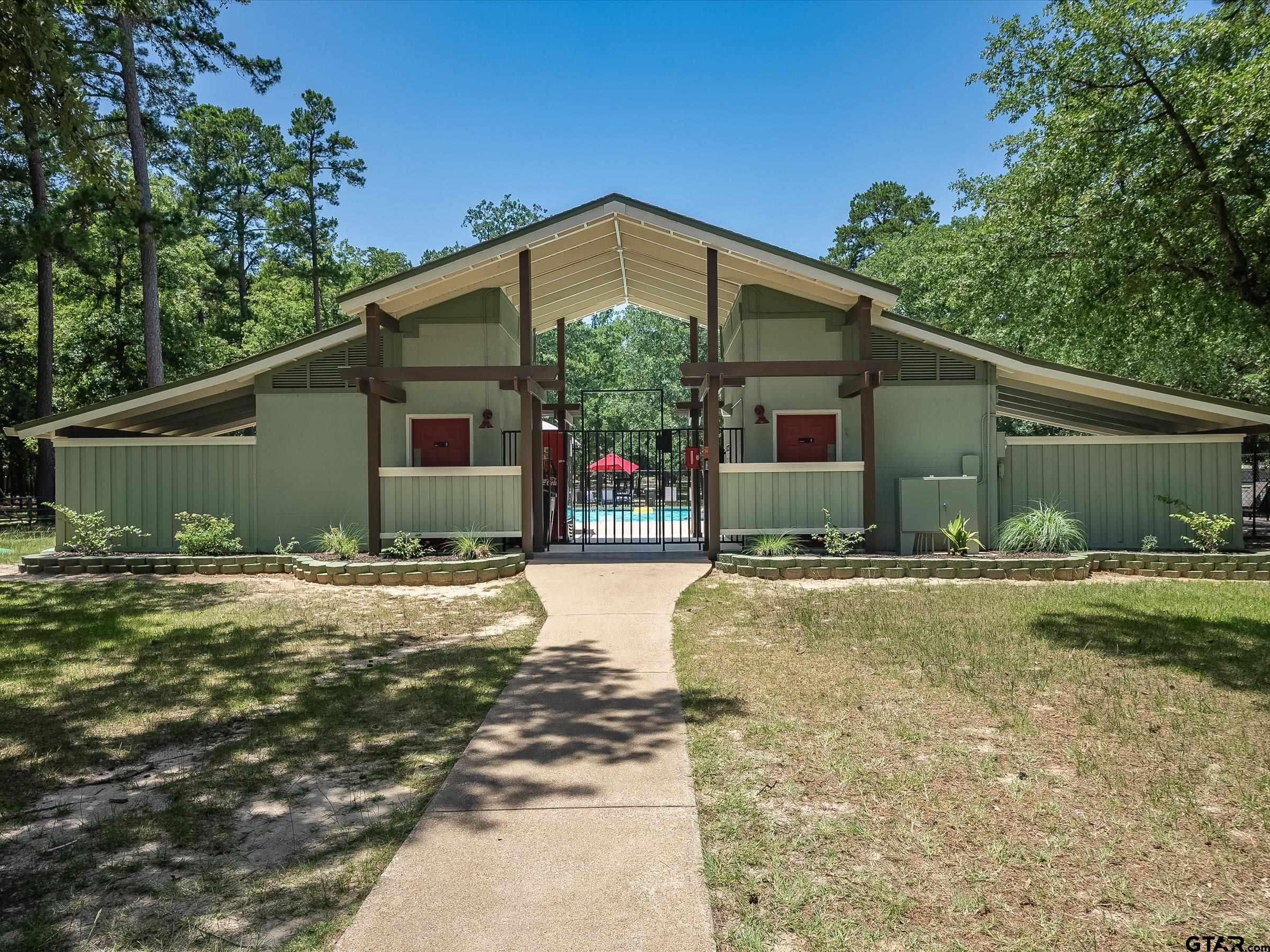 289 Llano Bend Holly Lake Ranch, TX 75765 - Photo 40 of 48 front view of a house with a yard