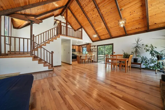 a bedroom with furniture and window