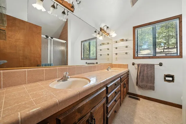 a view of a yard with a tree