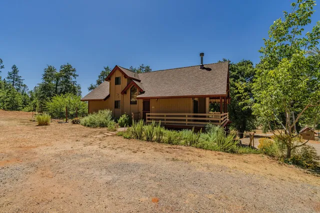 a view of swimming pool with a yard